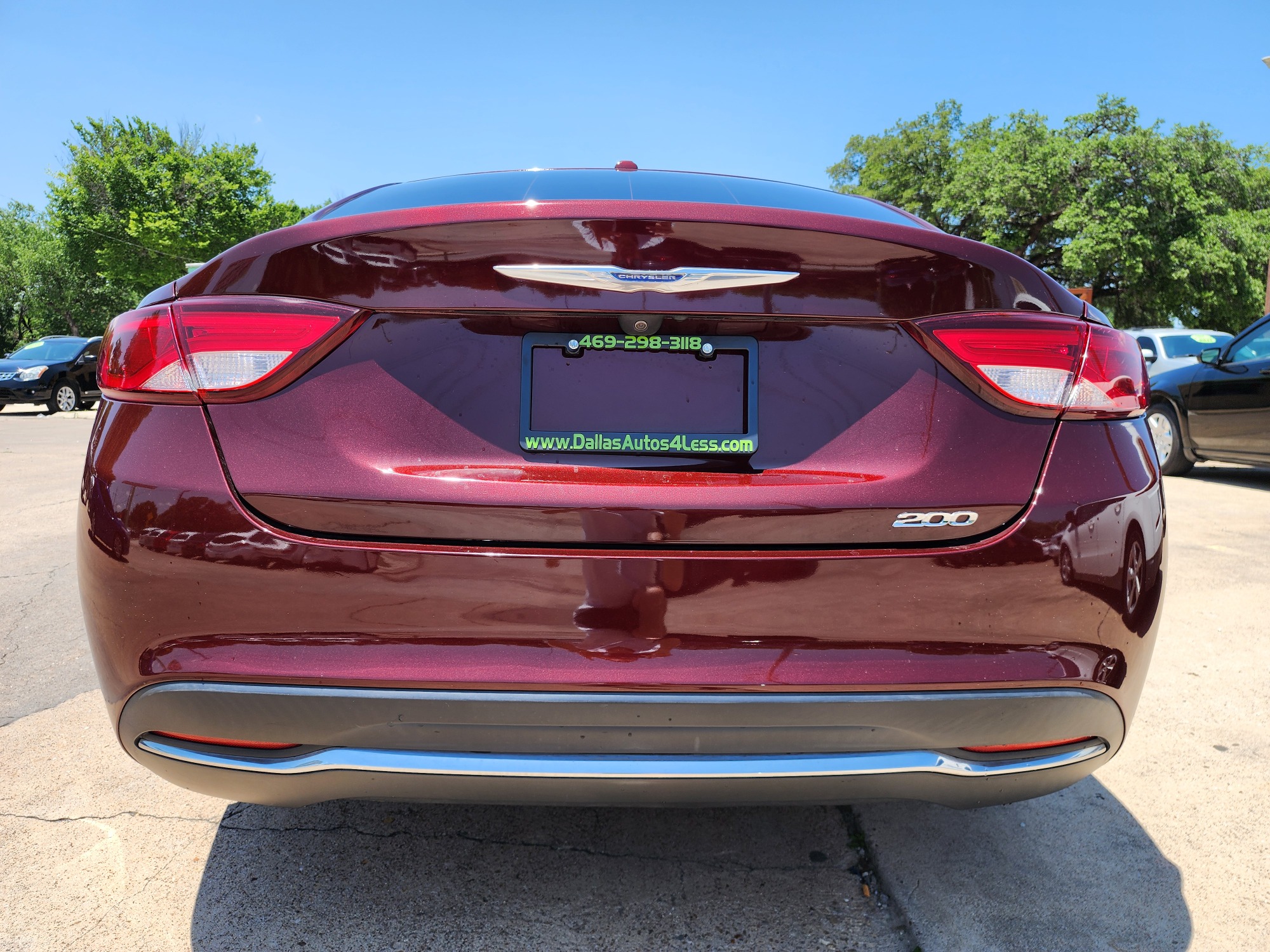 2015 Chrysler 200 Limited (1C3CCCABXFN) with an 2.4L L4 DOHC 16V engine, 9-Speed Automatic transmission, located at 2660 S.Garland Avenue, Garland, TX, 75041, (469) 298-3118, 32.885387, -96.656776 - Welcome to DallasAutos4Less, one of the Premier BUY HERE PAY HERE Dealers in the North Dallas Area. We specialize in financing to people with NO CREDIT or BAD CREDIT. We need proof of income, proof of residence, and a ID. Come buy your new car from us today!! This is a very well cared for 2015 Ch - Photo #4
